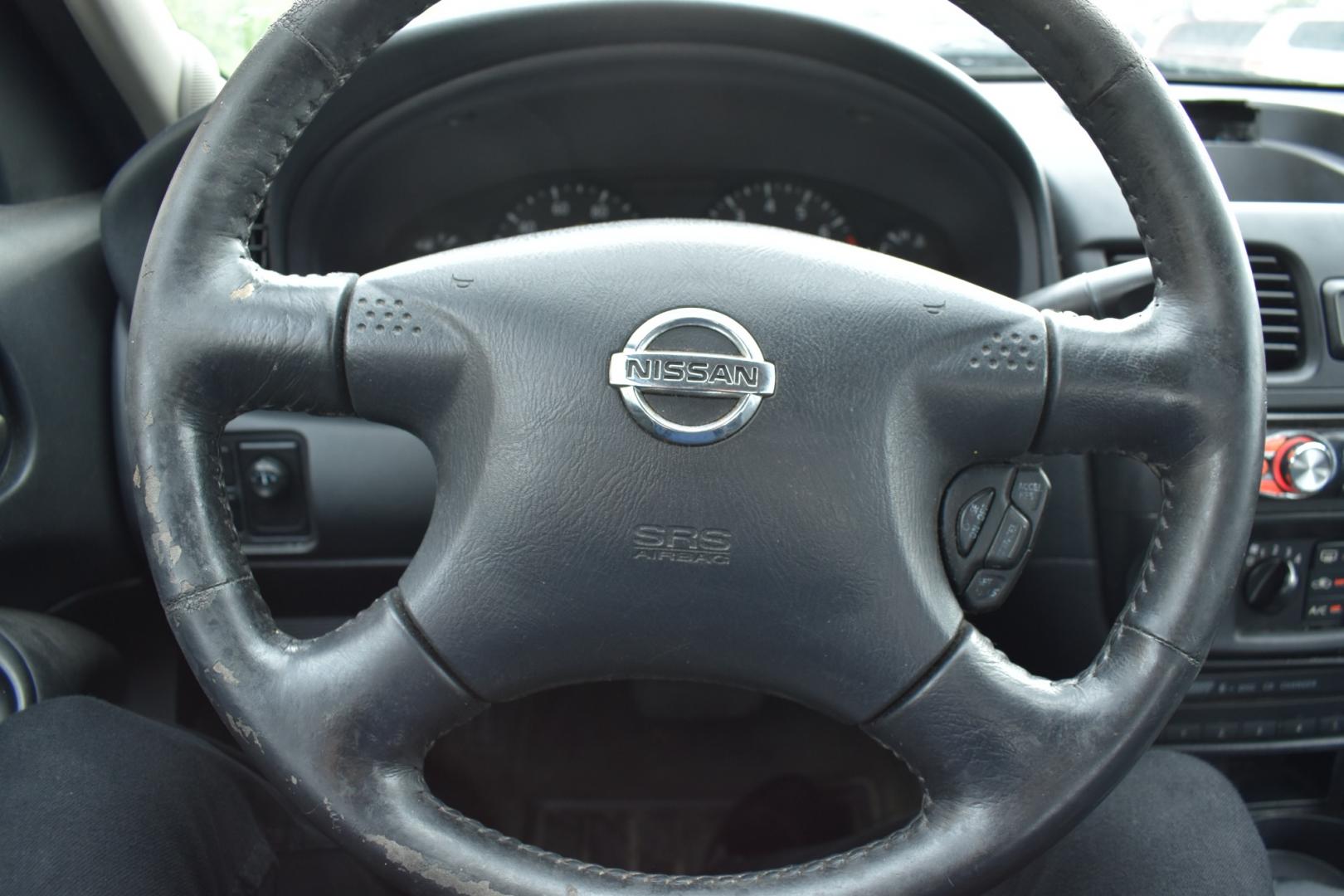 2005 Red Nissan Sentra 1.8 (3N1CB51D25L) with an 1.8L L4 DOHC 16V engine, 4 SPEED AUTOMATIC transmission, located at 5925 E. BELKNAP ST., HALTOM CITY, TX, 76117, (817) 834-4222, 32.803799, -97.259003 - Photo#9